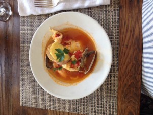 We made this delicious seafood stew with lobster, fish, clams and squid.  Super easy!